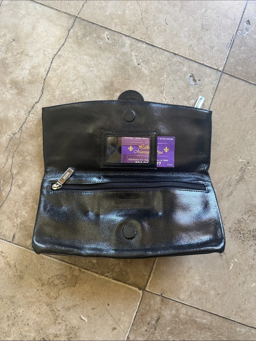 HOBO black leather fold over clutch preowned good condition